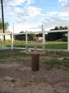 The well, and a view of the old fence in the back.