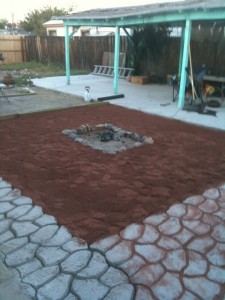 Red gravel and the establishment of the fire pit.